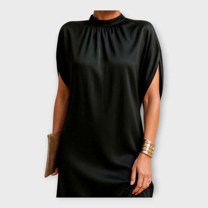 Elegantna mini obleka s klasičnim šarmom