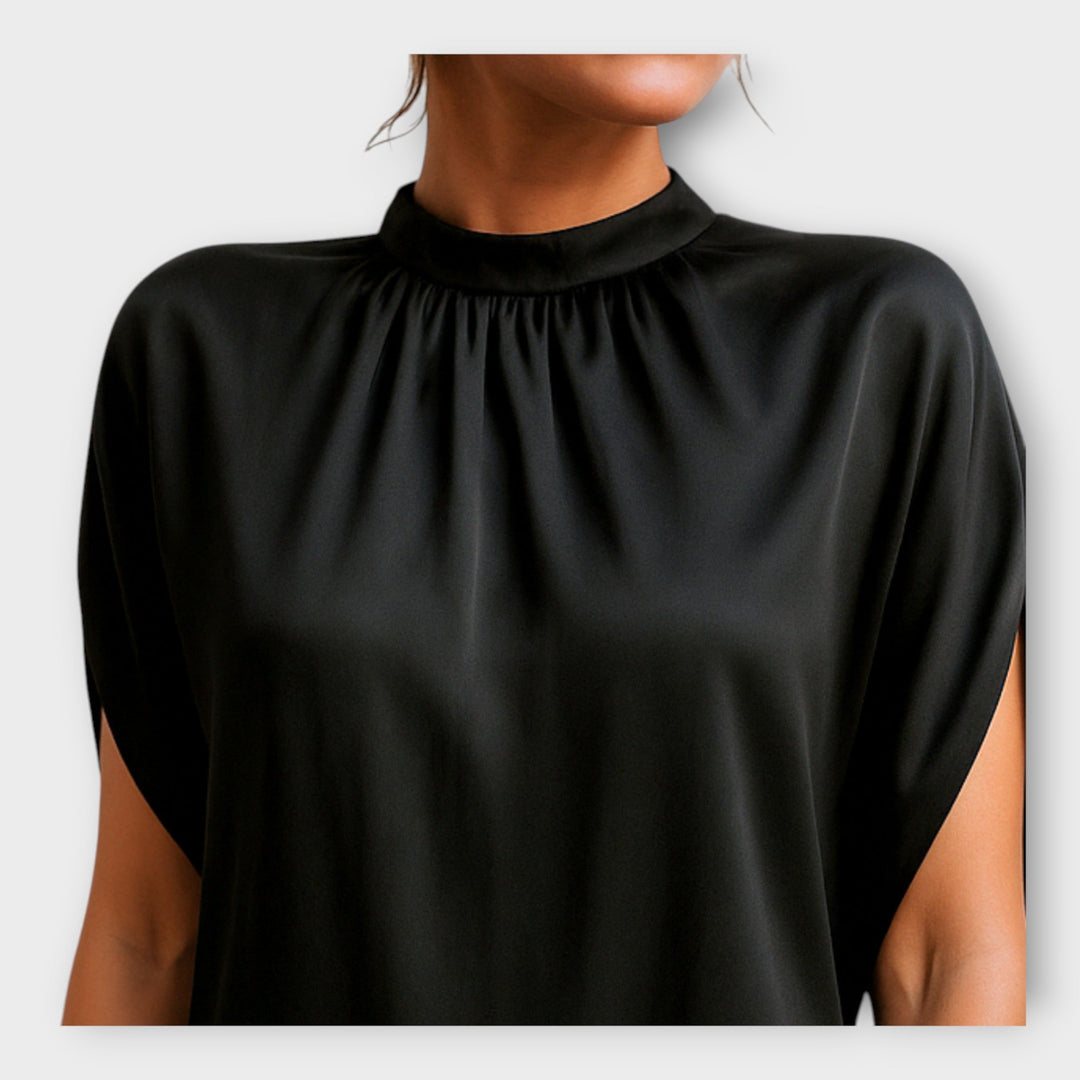 Elegantna mini obleka s klasičnim šarmom