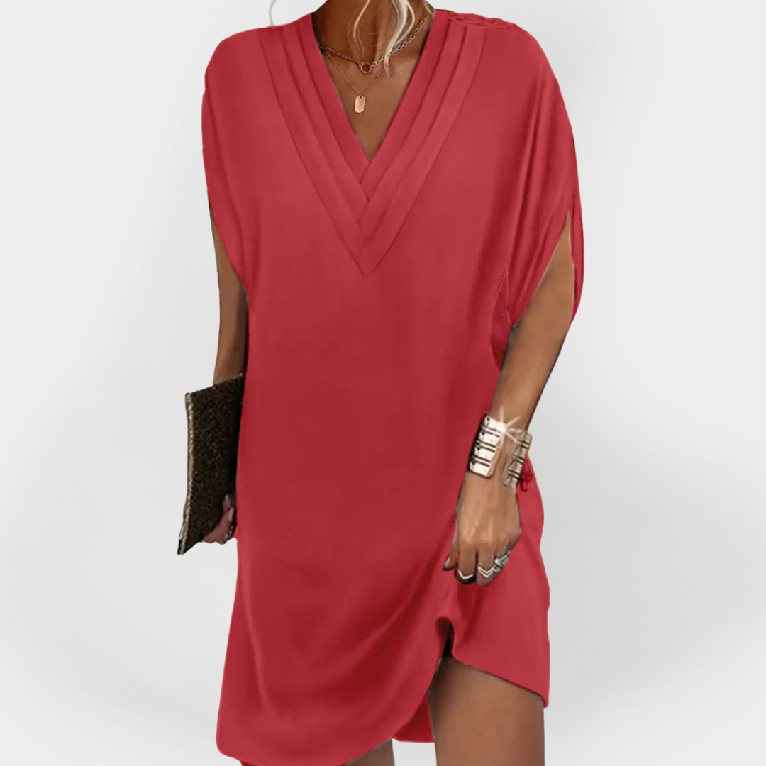 Eleganten oblek s flattering krojem