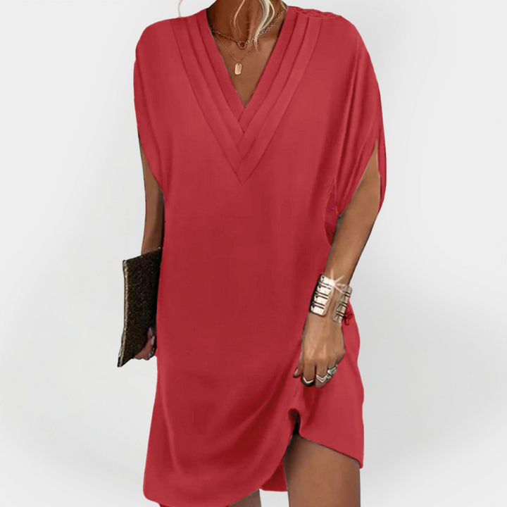 Eleganten oblek s flattering krojem