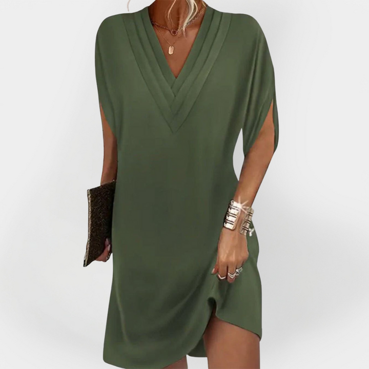 Eleganten oblek s flattering krojem