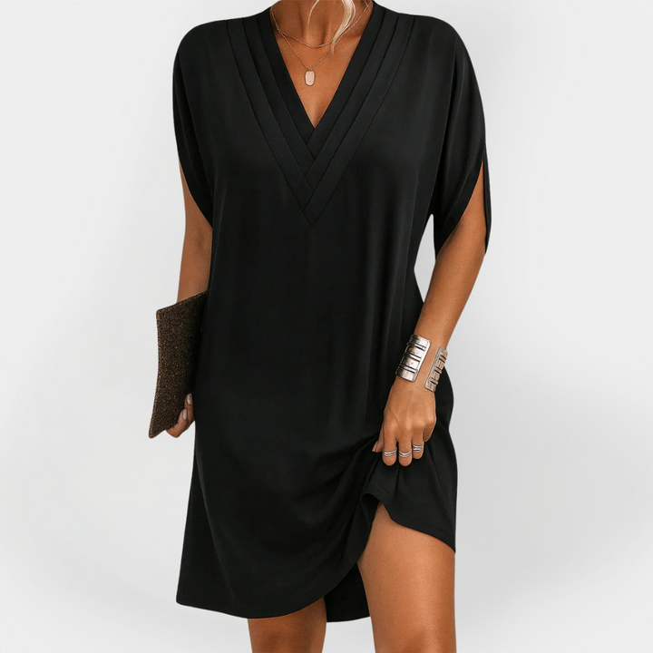 Eleganten oblek s flattering krojem