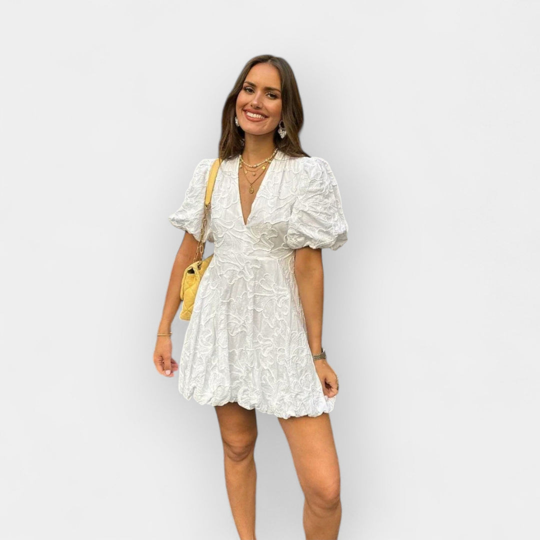 Elegantna Bela Obleka