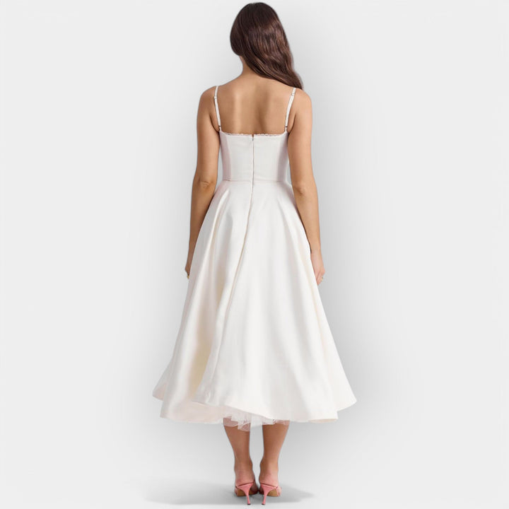 Elegantna midi obleka za poletne dni