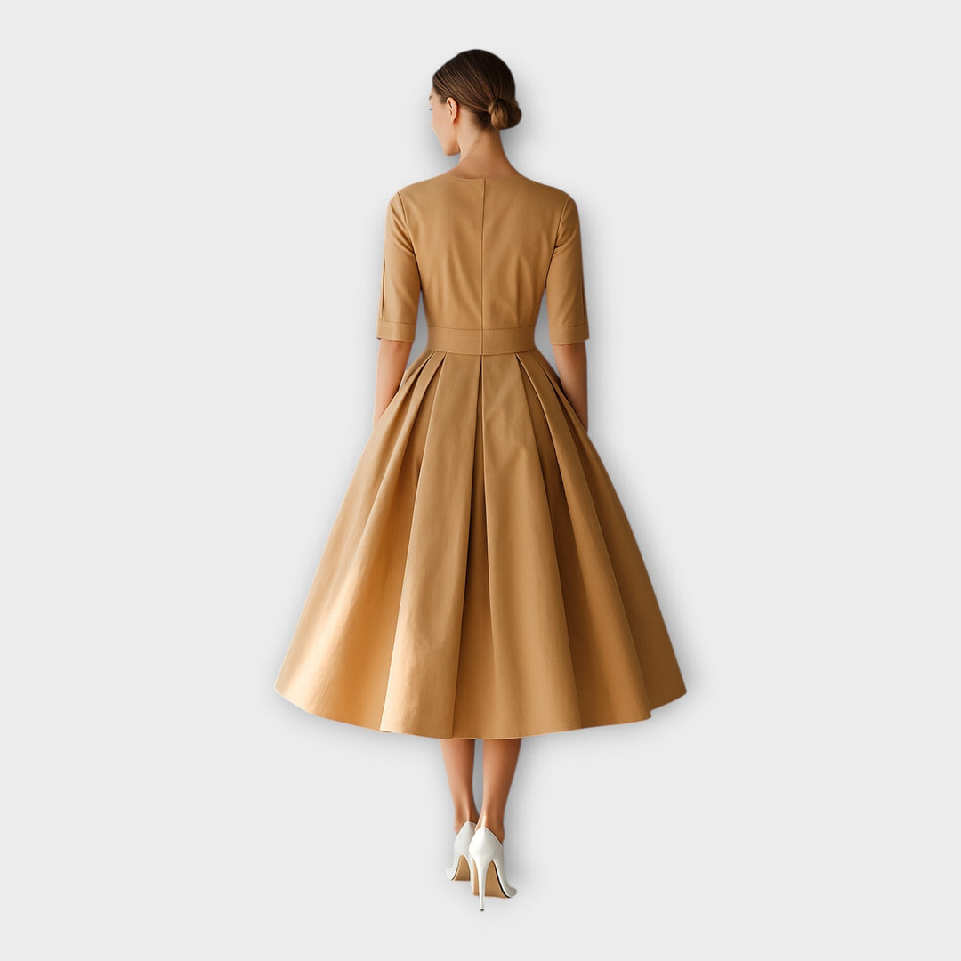 Midi obleka z elegantno minimalistično estetiko