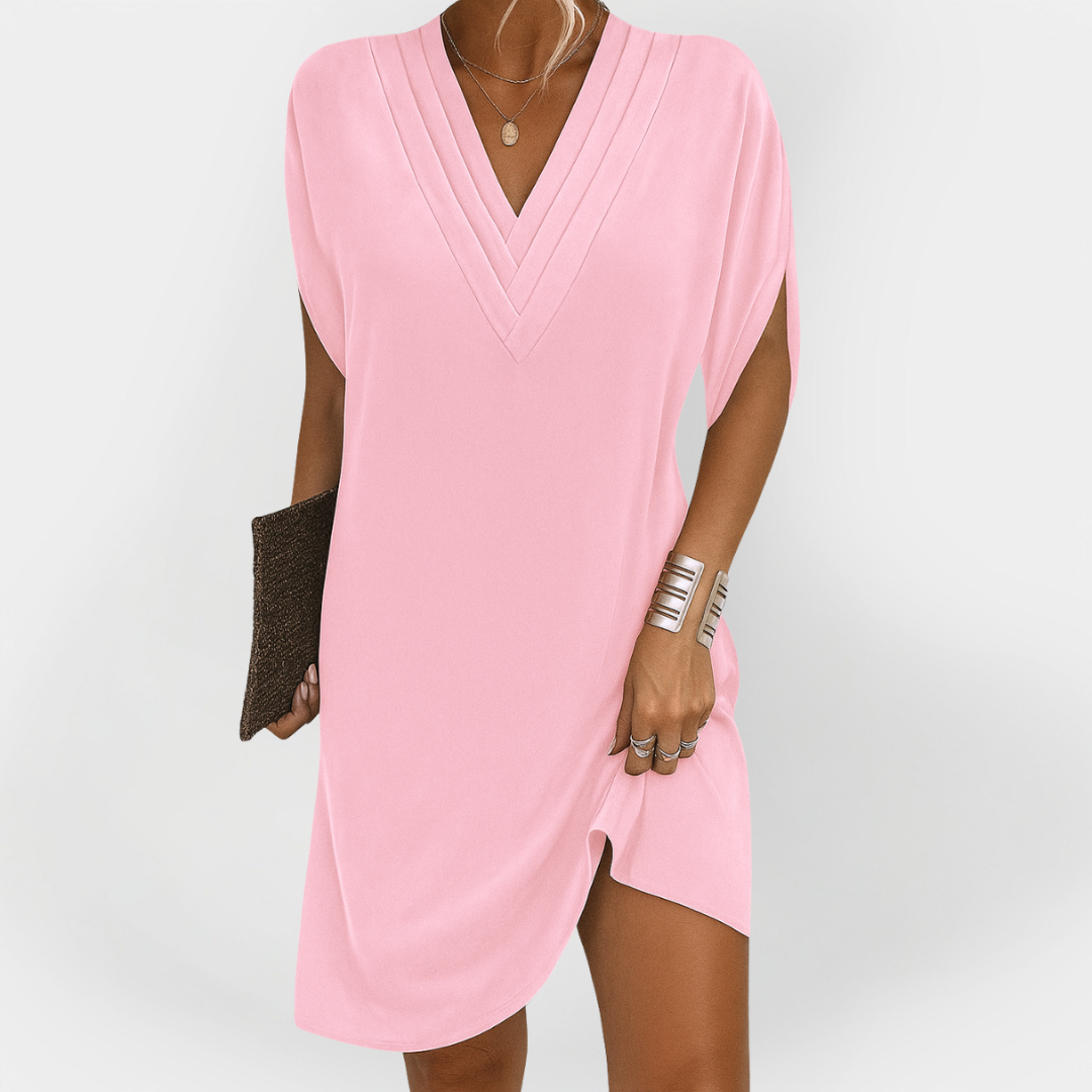 Eleganten oblek s flattering krojem