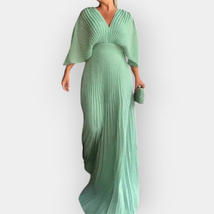 Stilna Plisirna Obleka z Eleganco